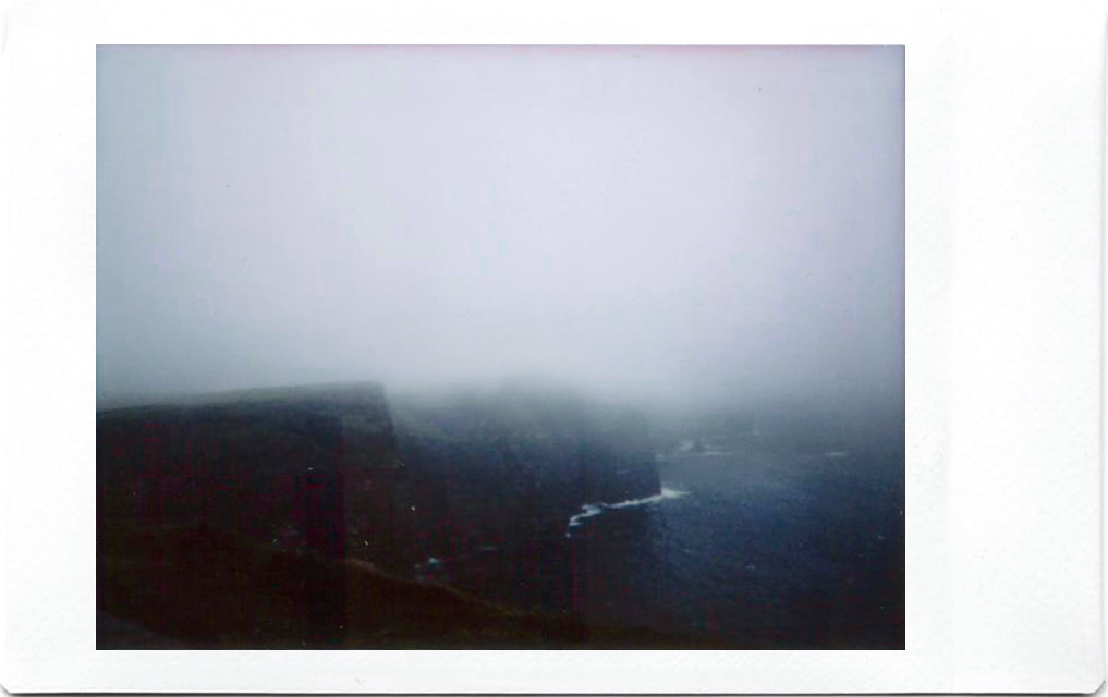 Fujifilm Instax Polaroid of Cliffs of Moher at a foggy day; West Atlantic Way; Ireland